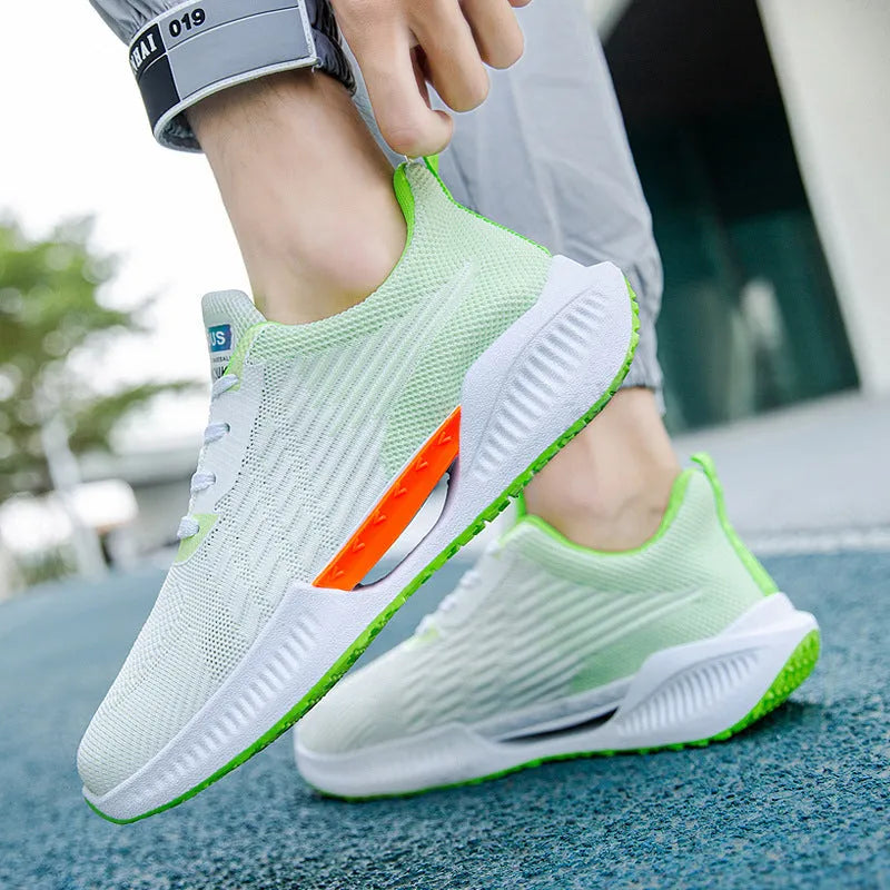 Men's blue casual mesh sports shoes with cloth upper and round toe on a plain background