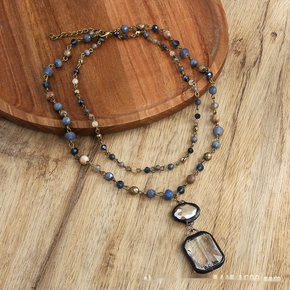 Tribal style two-layer necklace with glass and semi-precious stone pendant on adjustable chain
