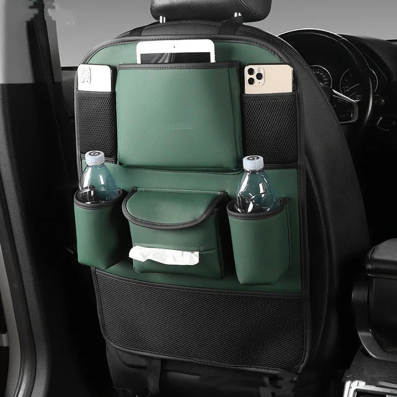 Leather car seat back storage bag in a choice of colours, shown hanging from a vehicle headrest.