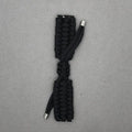 Paracord braided smart watch strap in black on a watch, showing woven texture and metal connectors.