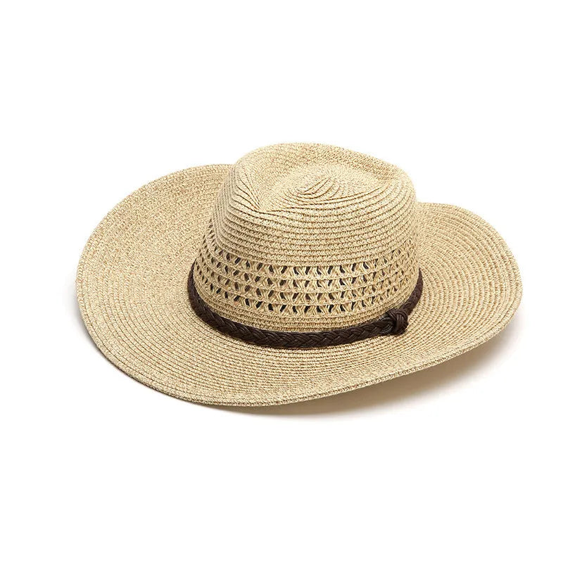 Men's foldable straw sun hat with large brim in beige colour on wooden surface