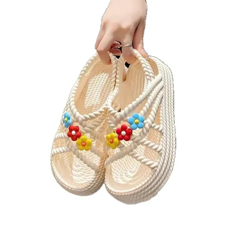 Women's PVC sandals with floral embroidery and non-slip soles in beige or black colours