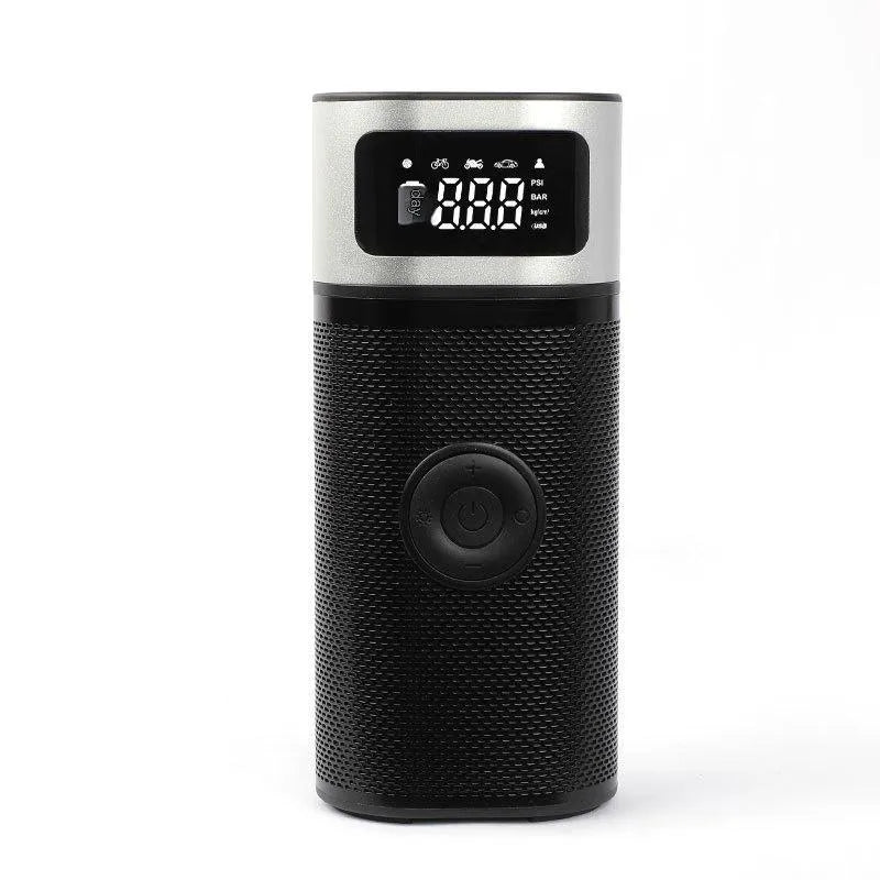 Black portable wireless smart vehicle air pump with hoses and nozzles on a storage bag.