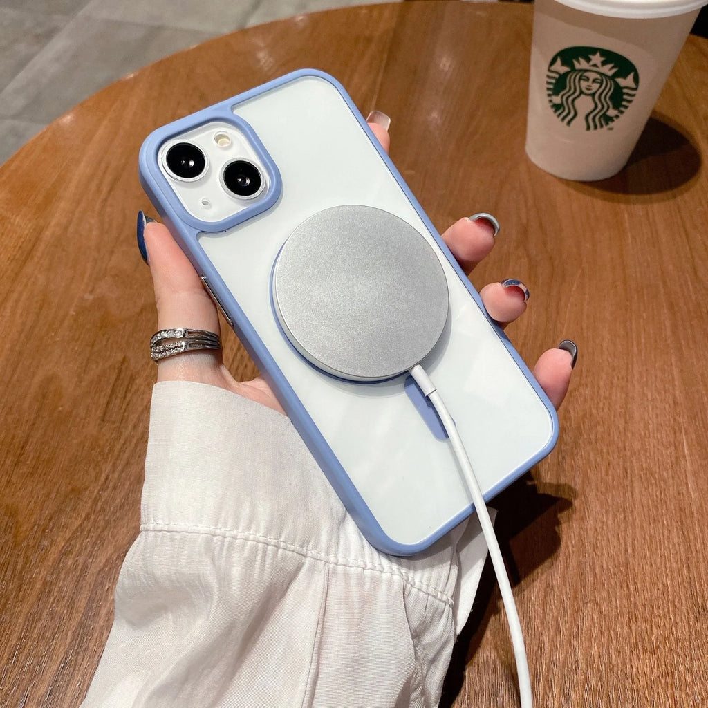 Transparent acrylic MagSafe phone case for iPhone on a table, showing magnetic ring and colour options.