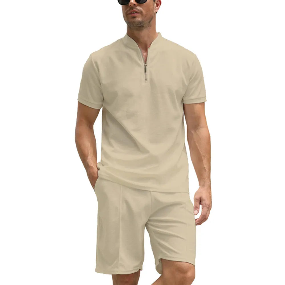 Men's solid colour polo shirt and trouser two-piece set in beaded bird's eye polyester fabric.