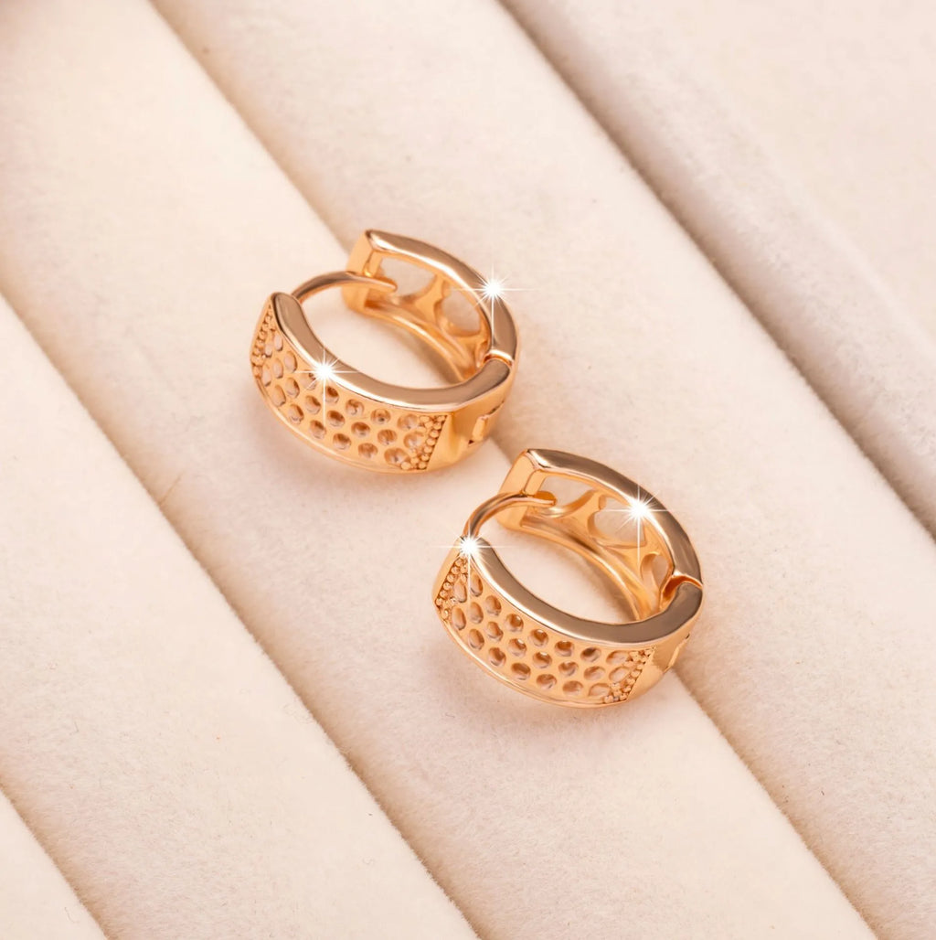 Rose gold hollowed heart shaped women's earrings with electroplated finish