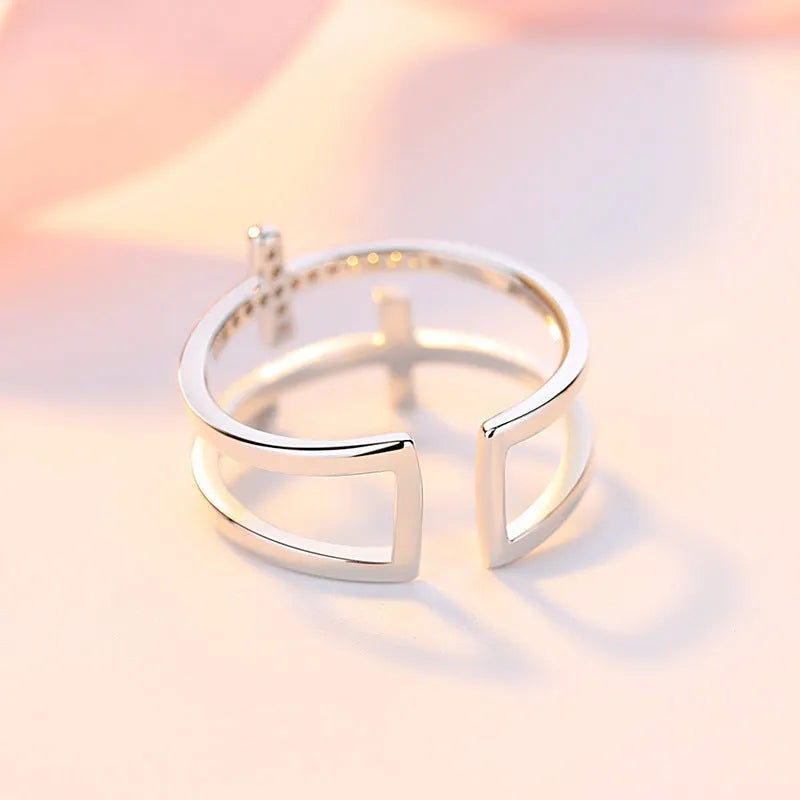 Women's adjustable copper ring with geometric double cross design and zircon detailing