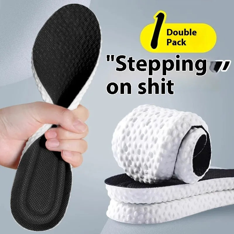 Breathable grey, black, and orange PU foam sports insoles with cut-to-fit sizing lines.