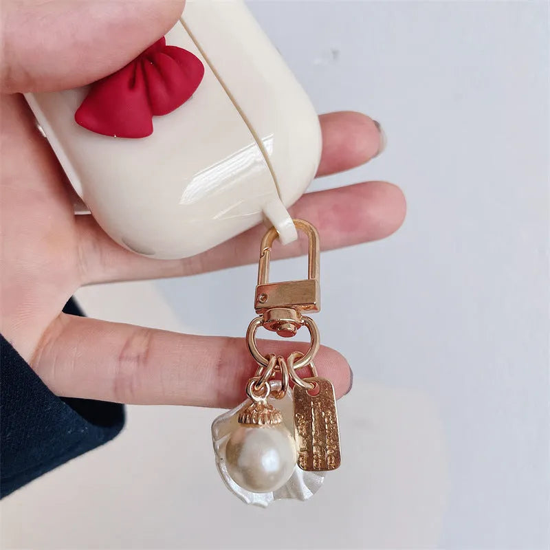 Beige red bow shell TPU earphone case for AirPods with clamshell closure
