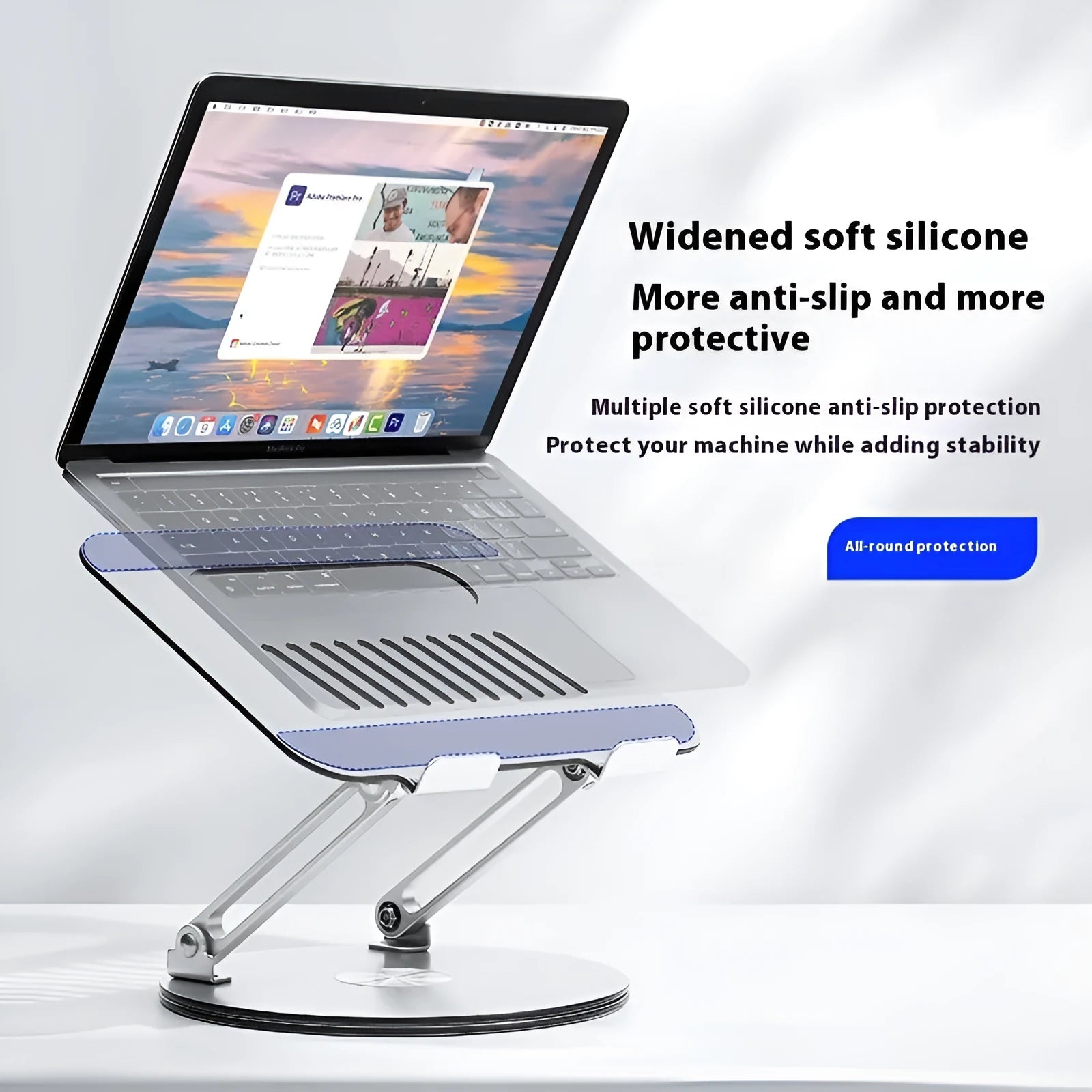 Silver aluminium laptop stand with adjustable height and rotating function on desktop