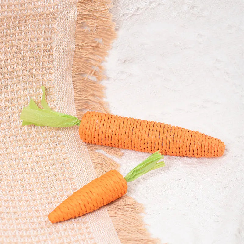 Bundle of cat toys including carrot-shaped paper bites, ringing stones, slender cat sticks and tooth grinding chews