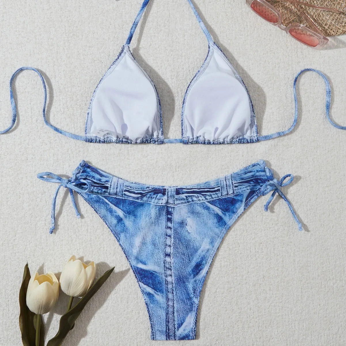 Women's denim blue printed bikini set with strap design, showing front and back views