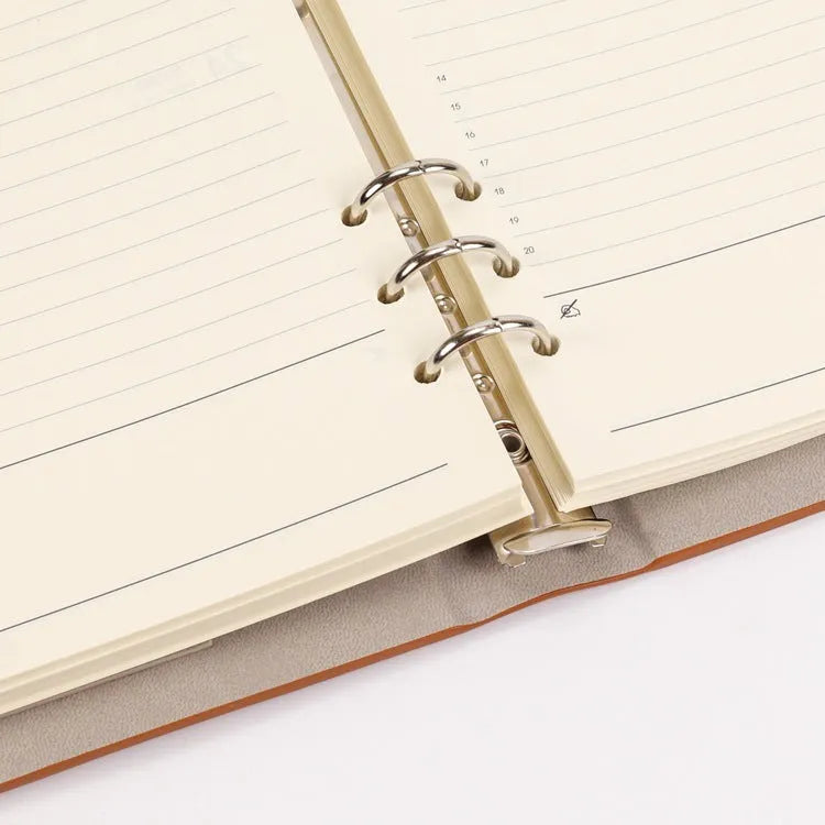 A5 white loose-leaf notebook inner pages with monthly plan layout on paper