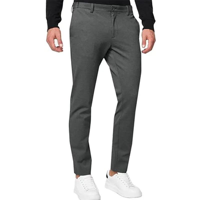 Men's slim-fit tapered chino trousers in a solid colour, showing the tapered leg and casual style.