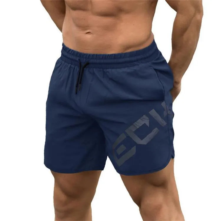 Men's black knee-length training shorts with an elastic waistband, made from quick-dry nylon blend fabric.