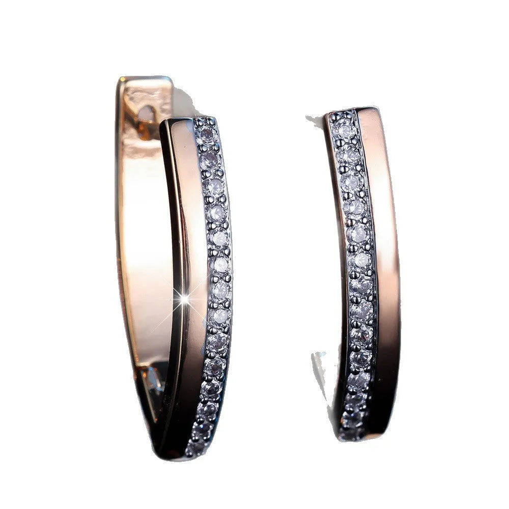 Geometric V-shaped women's ear clips with champagne gold electroplated finish on copper