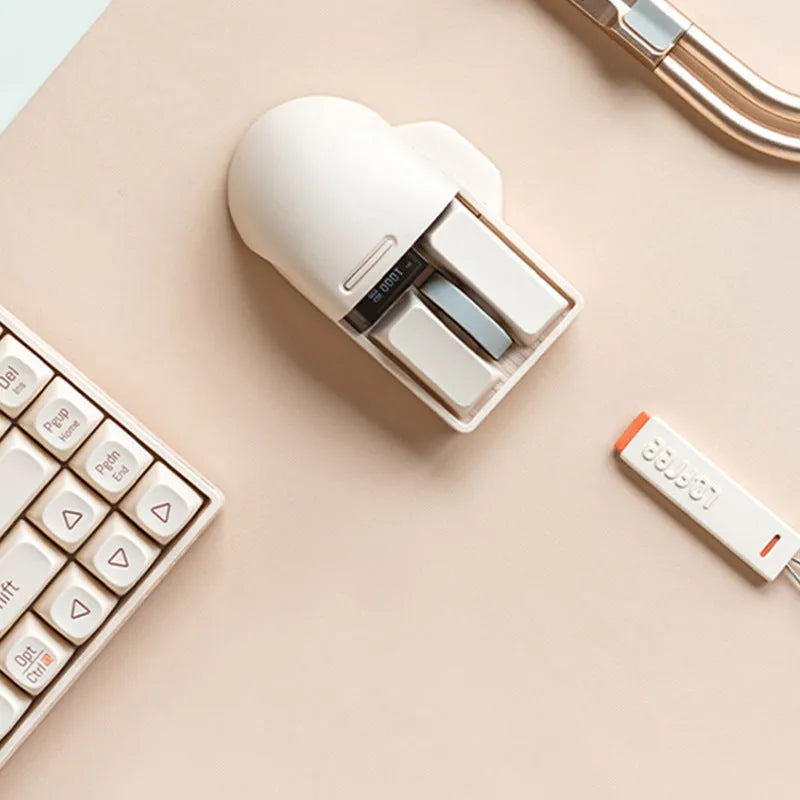 Xiaoqiao three-mode wireless mouse in matte finish showing ergonomic right-hand design with USB receiver and charging cable