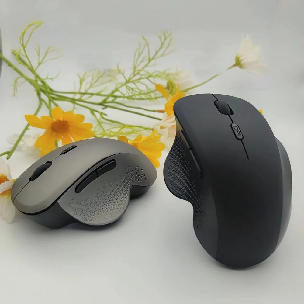 Black and grey USB rechargeable wireless optical mouse for laptops with charging cable.