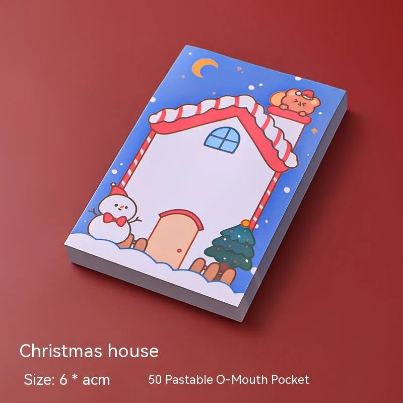 Christmas cartoon sticky notes pad showing eight festive designs including Santa Claus, snowman, and Christmas elf