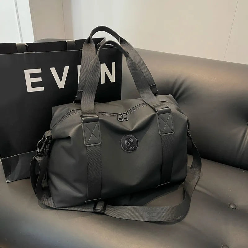 Large capacity waterproof travel bag in Oxford cloth with breathable back panel and multiple colour options