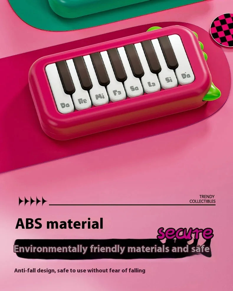 Baby pocket electronic keyboard with little piano pattern in green plastic design