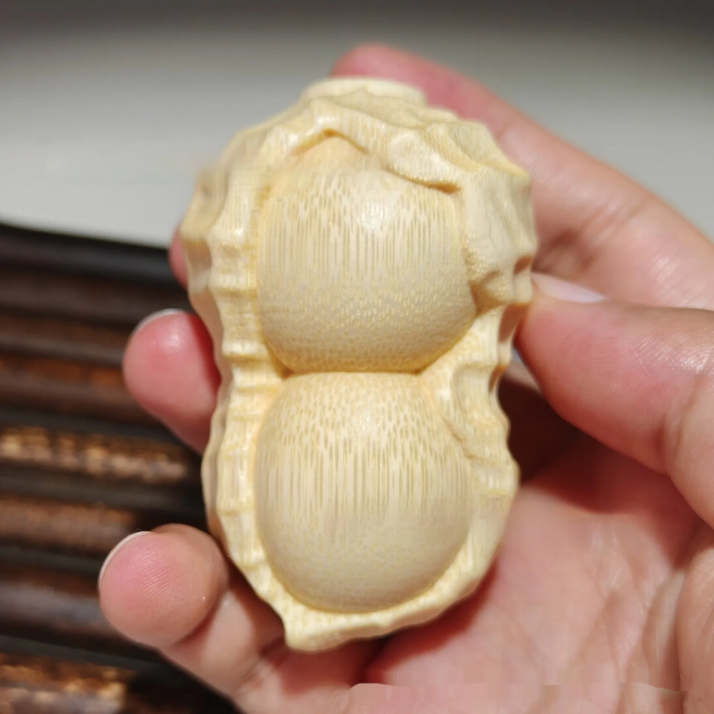 Natural bamboo peanut ornament with modern simplicity design for multiple gifting occasions