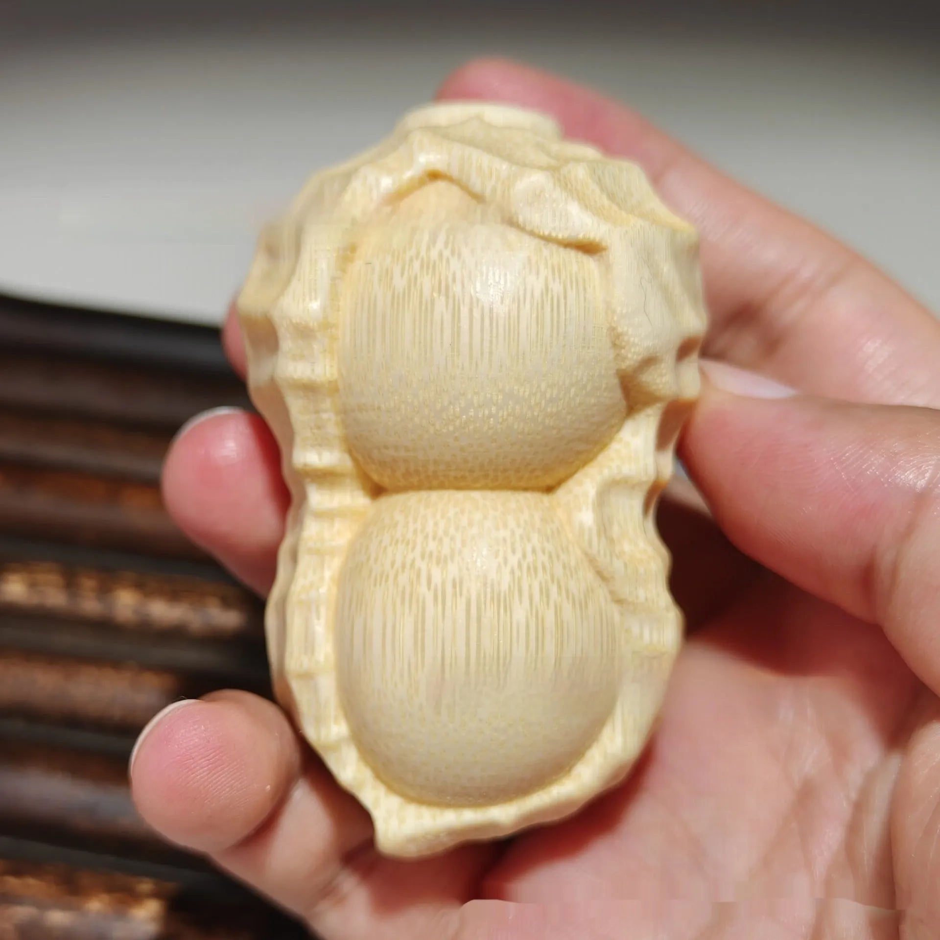 Natural bamboo peanut ornament with modern simplicity design for multiple gifting occasions