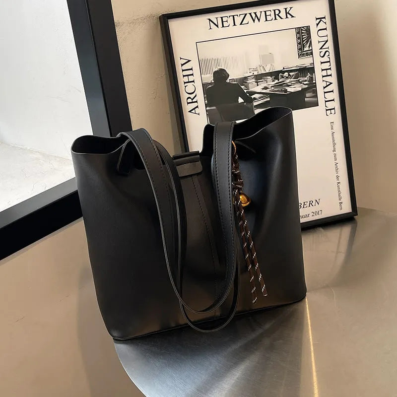 Fashionable commuter shoulder bag PU leather horizontal square shape brown colour with pendant inner patch pocket
