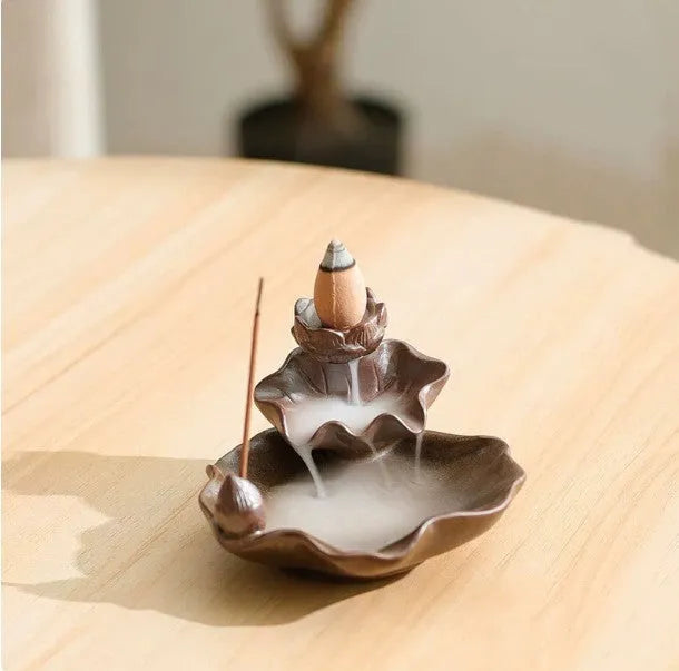 Square purple clay ceramic incense burner with lotus motifs and crystal glaze