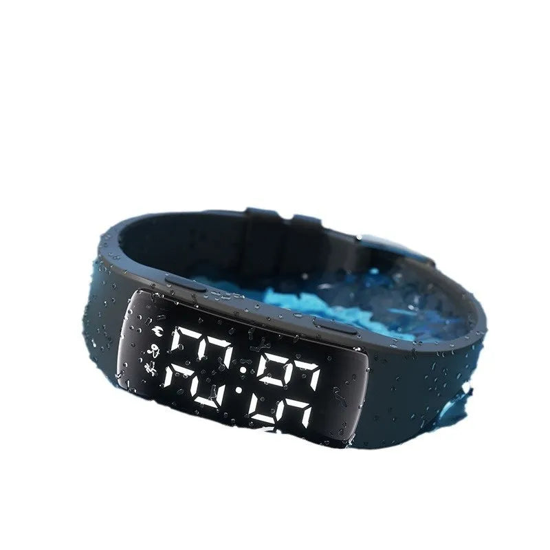Waterproof smart watch with vibration alarm, LED display, and silicone strap in multiple colour options