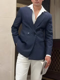Men's classic striped double-breasted blazer on hanger showing front button fastening
