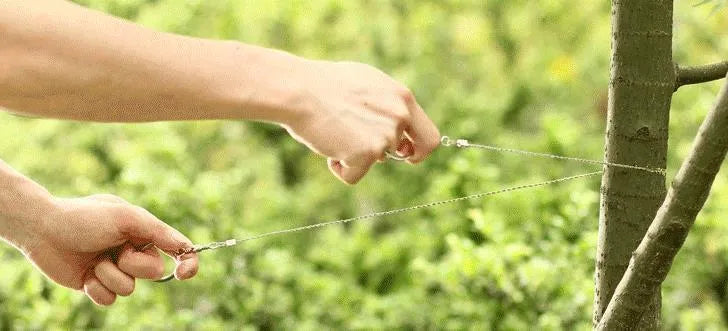 Outdoor survival steel wire saw with leather case in black colour showing 70cm length