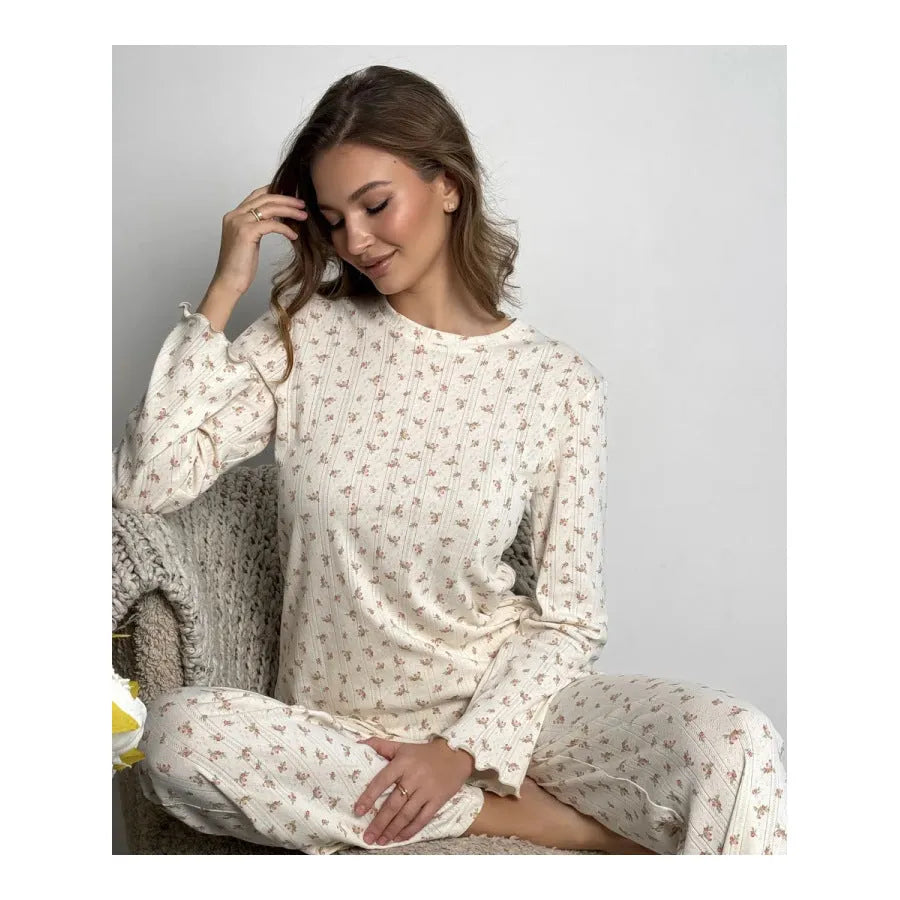White floral print women's two-piece lounge suit with bell sleeves and wide-leg trousers