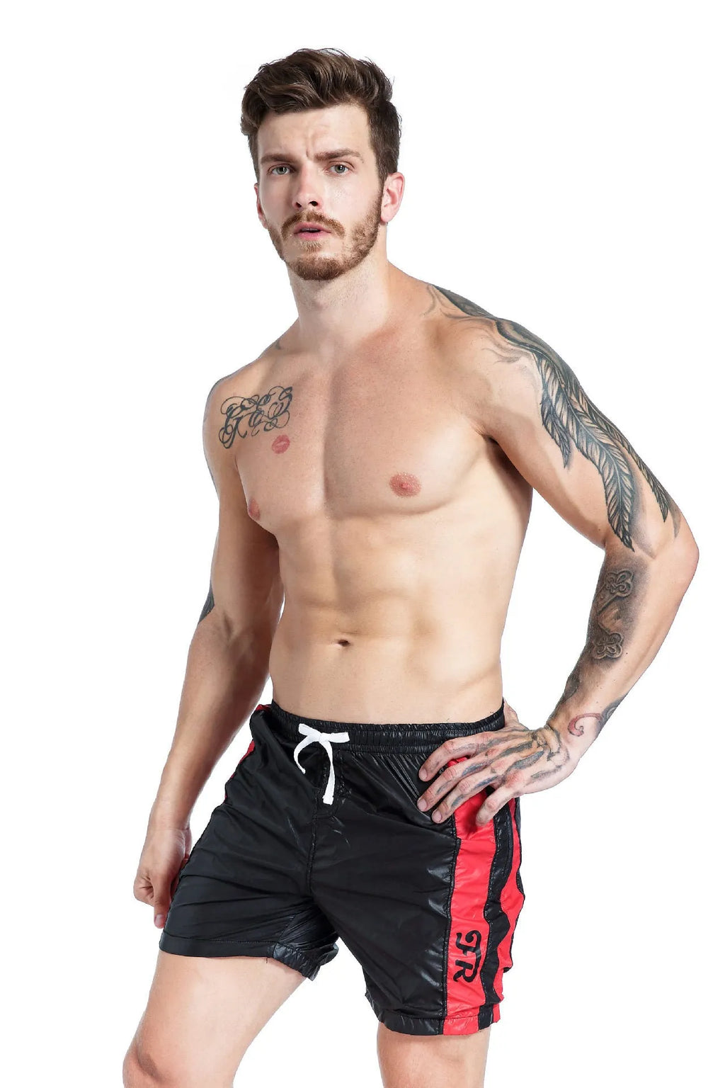 Men's blue sports shorts with lace-up front and slim fit, shown on a model.