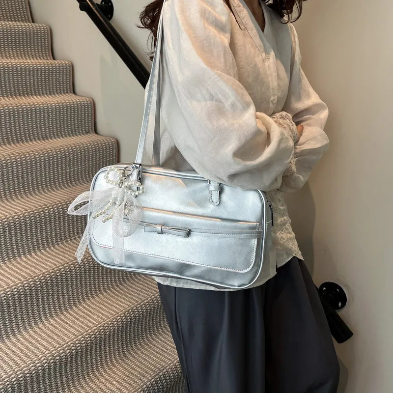 Women's PU leather single shoulder bag in horizontal square shape with flap closure and double straps