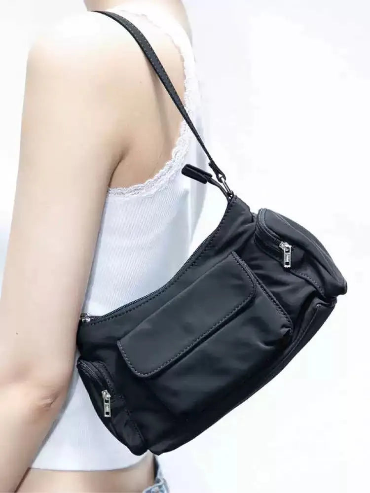 Black PU leather women's shoulder bag with double pockets and side line detailing