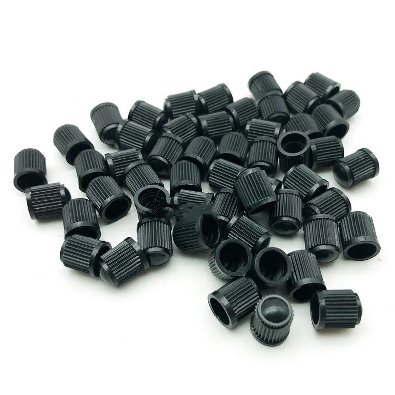 Black plastic tubeless valve with American mouth thread for GM models on white background
