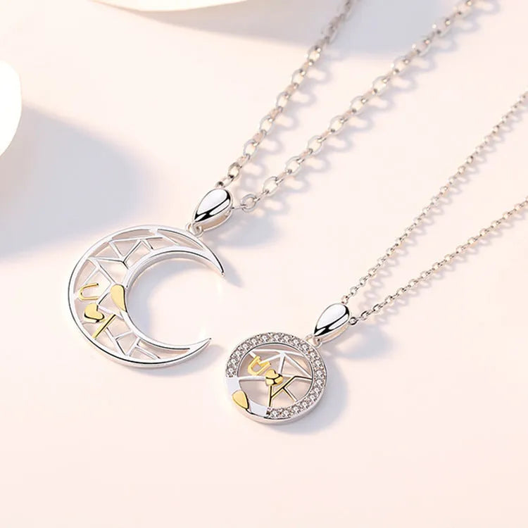 Sun and moon couple necklace with copper pendant on cross chain, showing male and female colour options