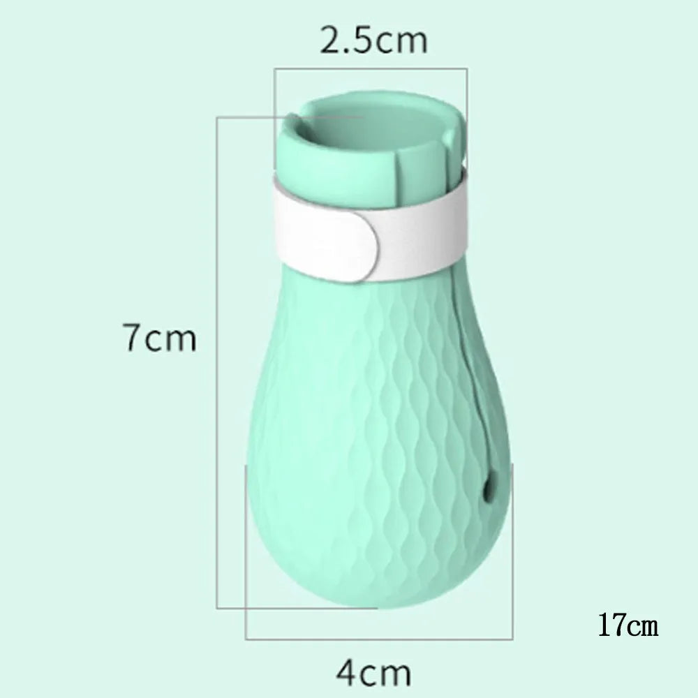 Transparent green silicone cat anti-scratch foot covers showing four protective gloves for pet handling