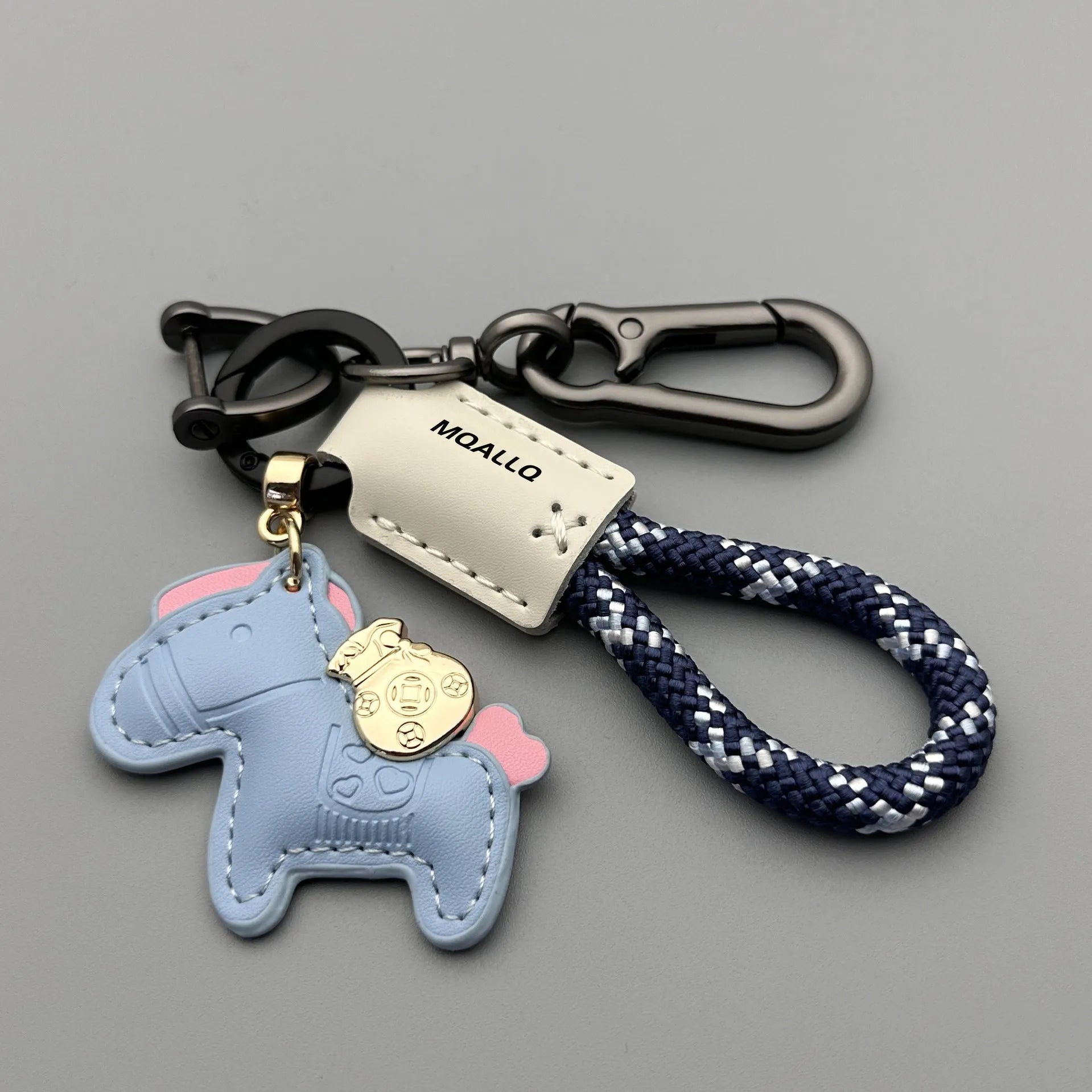 Handmade car keychain with a zinc alloy pony charm on a cowhide cord, shown in multiple colour options.