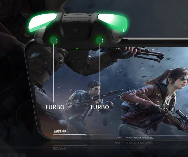 Black F5 Bluetooth mobile game controller with phone clamp next to smartphone