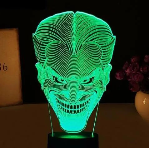 3D LED table lamp with acrylic base showing colourful gradient lighting, remote control, and USB cable