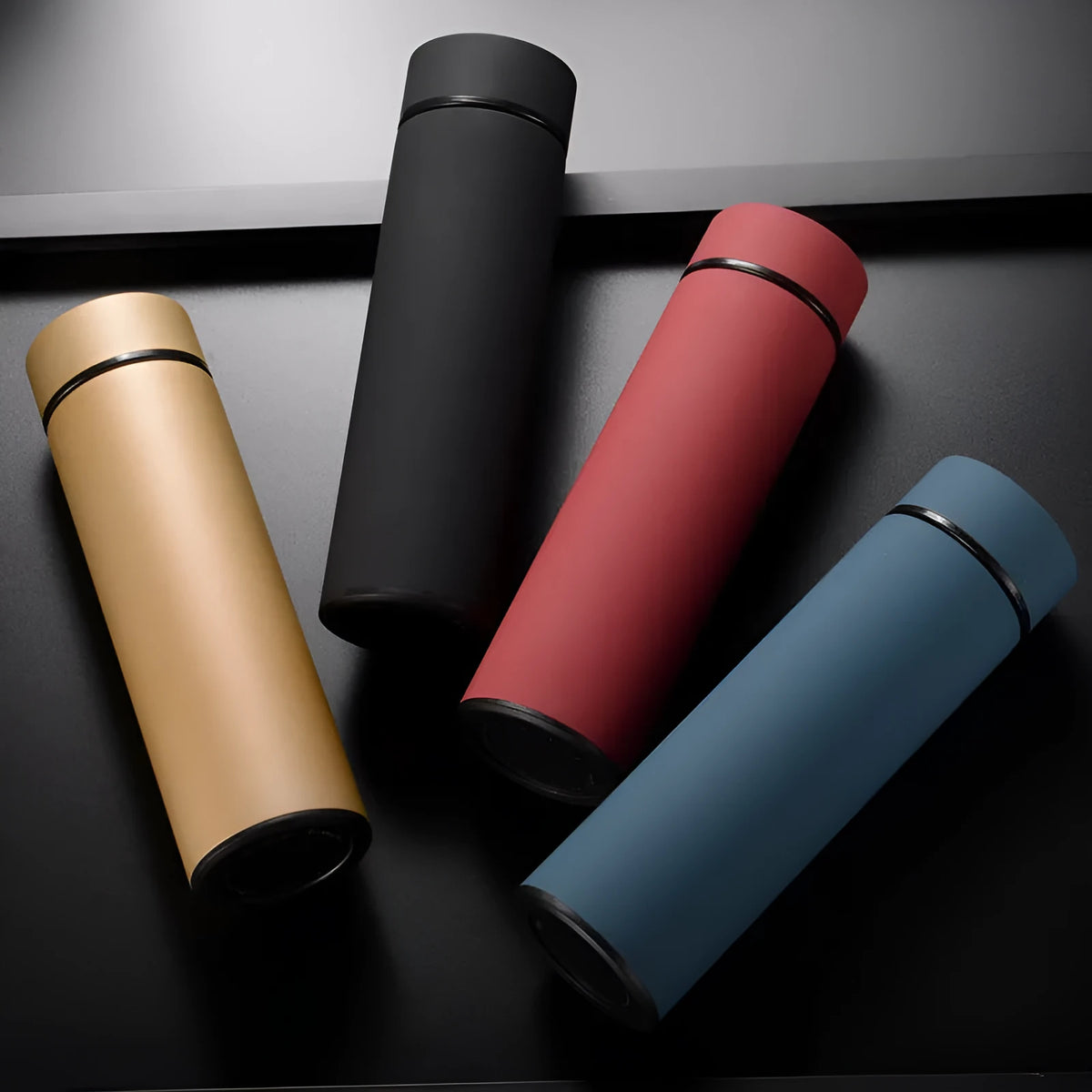 450ml stainless steel vacuum insulated water bottle in black, red, gold, or blue