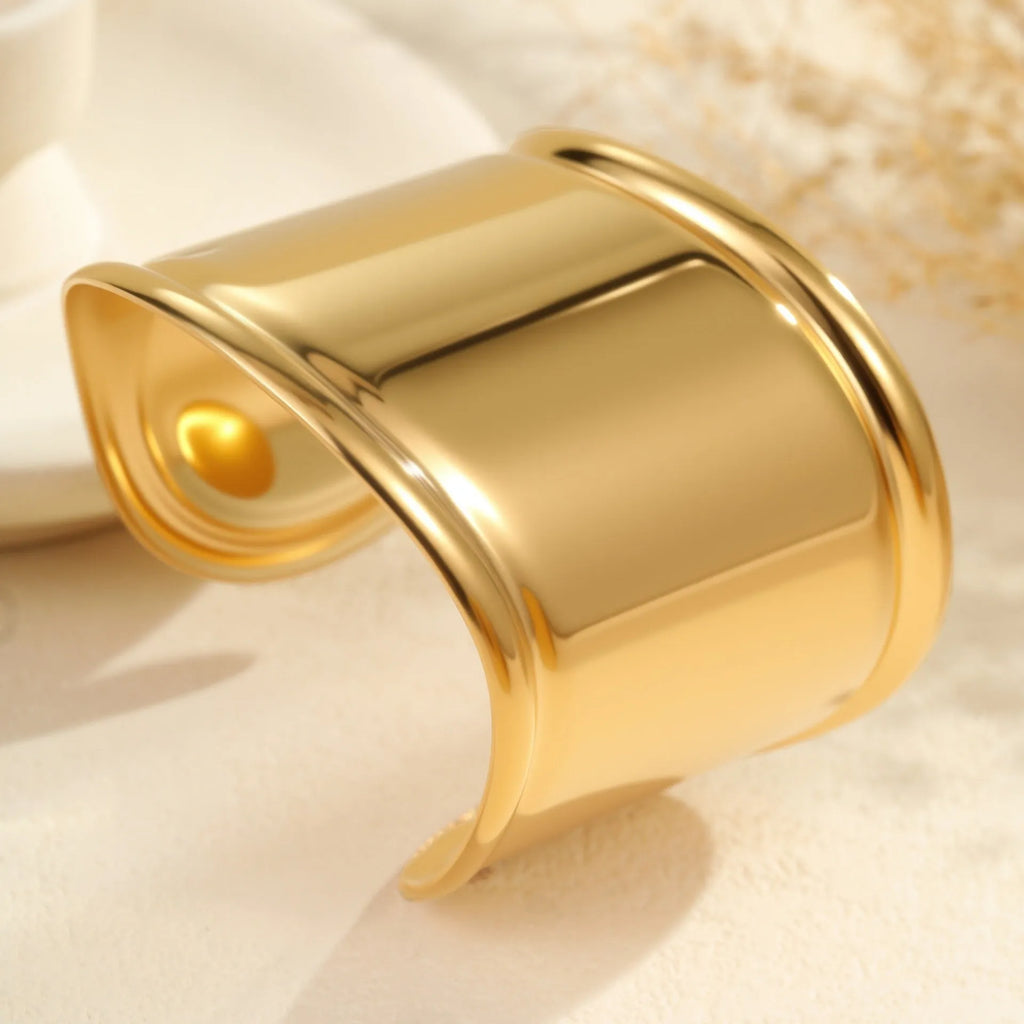 Women's stainless steel bracelet with 18K gold plating in geometric wave design