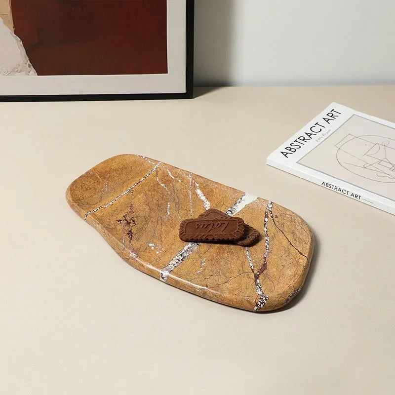 Irregular art marble tray in natural stone, 33.5x19cm, Coffee colour, with smooth polished surface on a wooden table