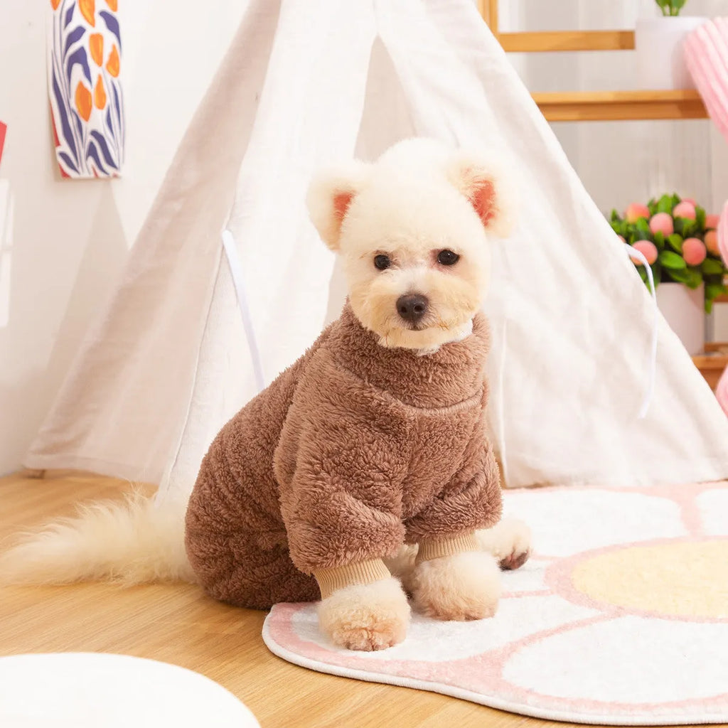 Khaki four-legged dog jumper with high collar and a towing ring on the back, made of thick plush fabric.