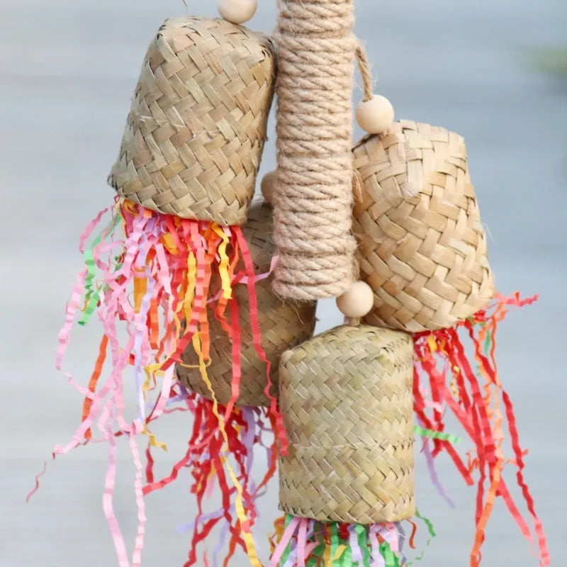 Colourful shredded paper parrot chewing toy with wood and sisal rope construction