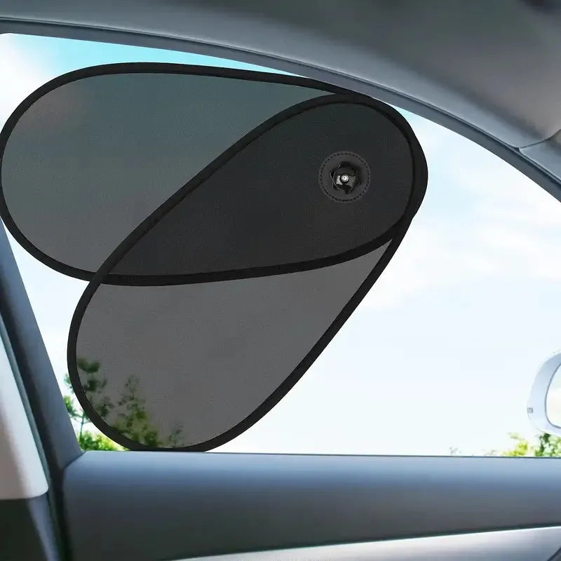 Black breathable car side window shade with suction cups stretched over a car window