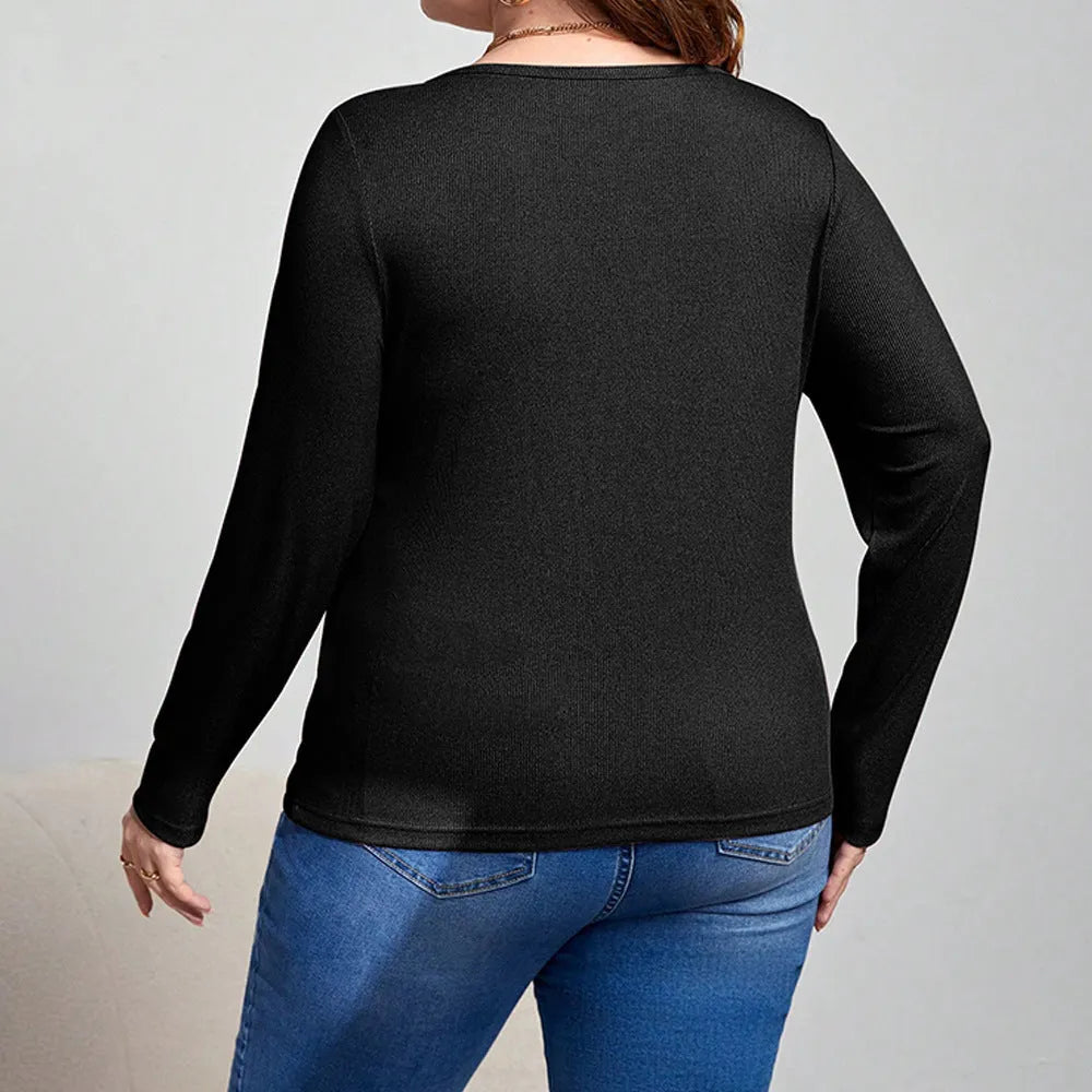 Women's slim-fit black knit pullover top with hollow-out design and long sleeves