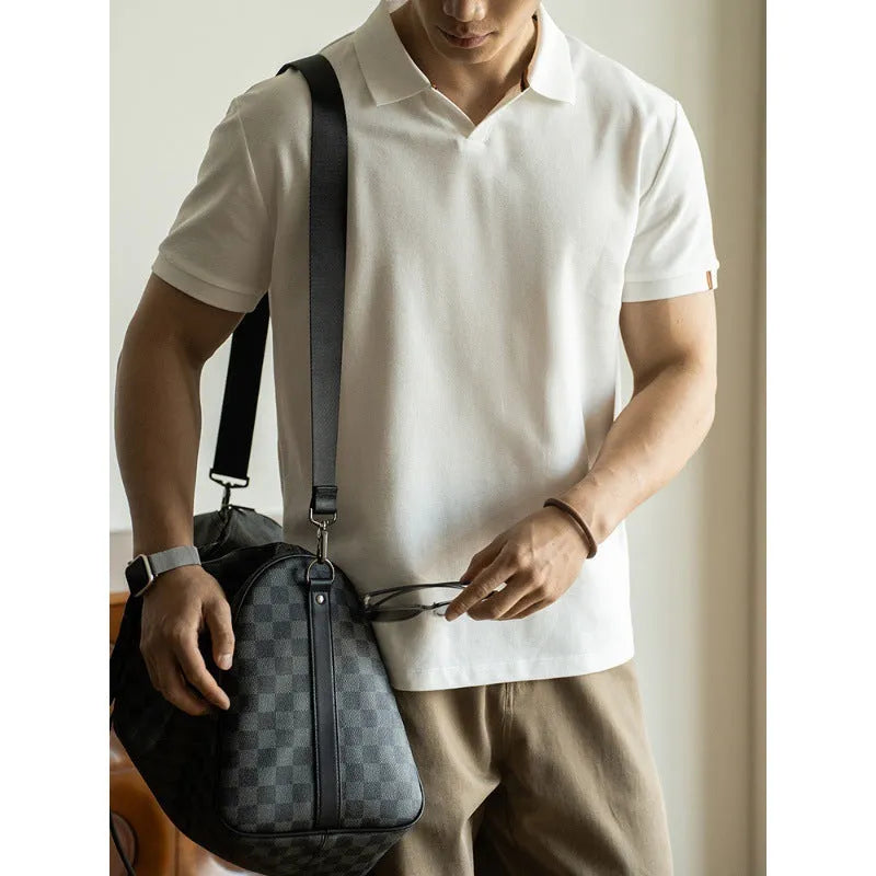 Man's blue short-sleeved cotton blend polo shirt with a collar, regular fit for summer.